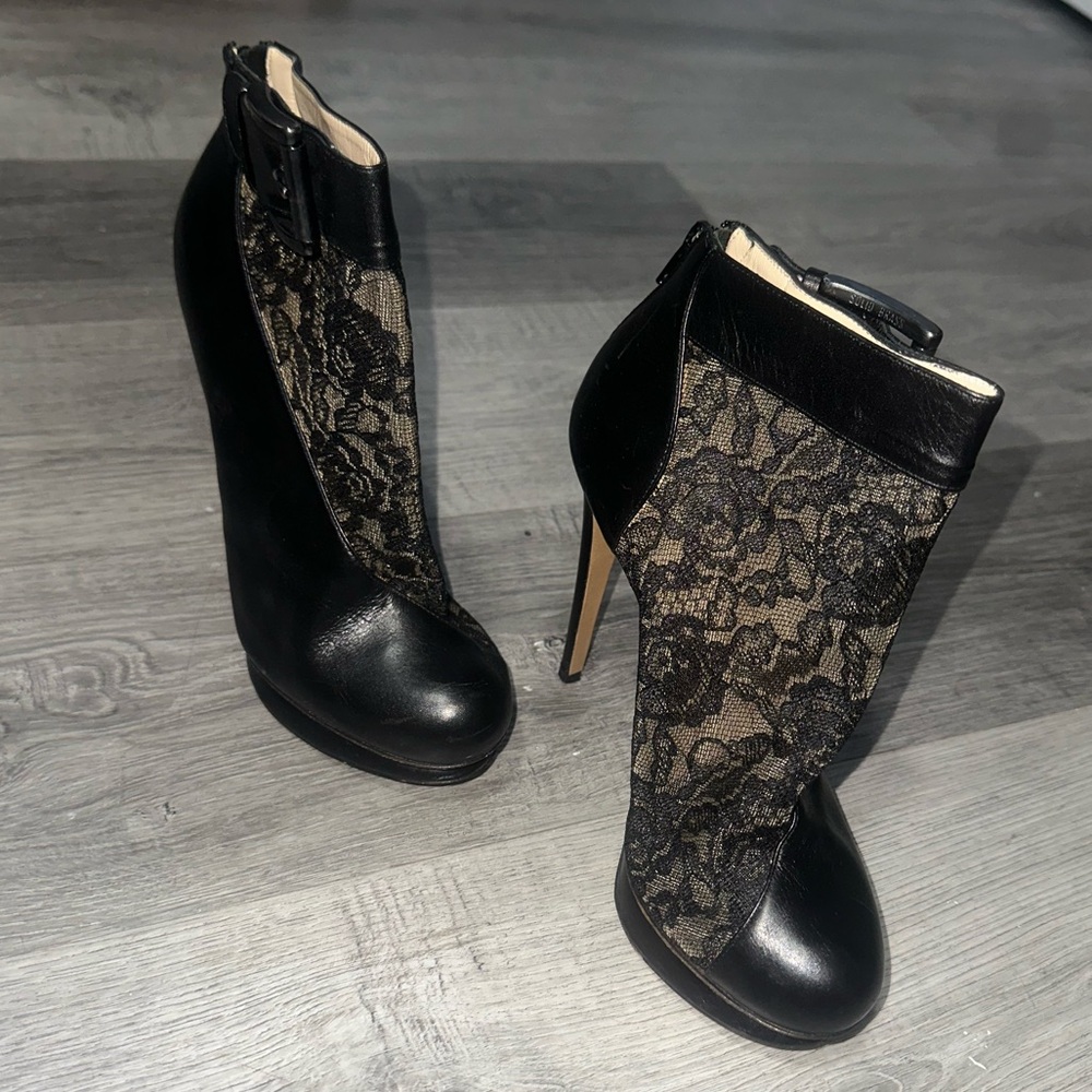 Nicholas Kirkwood high heel black leather and lace booties.